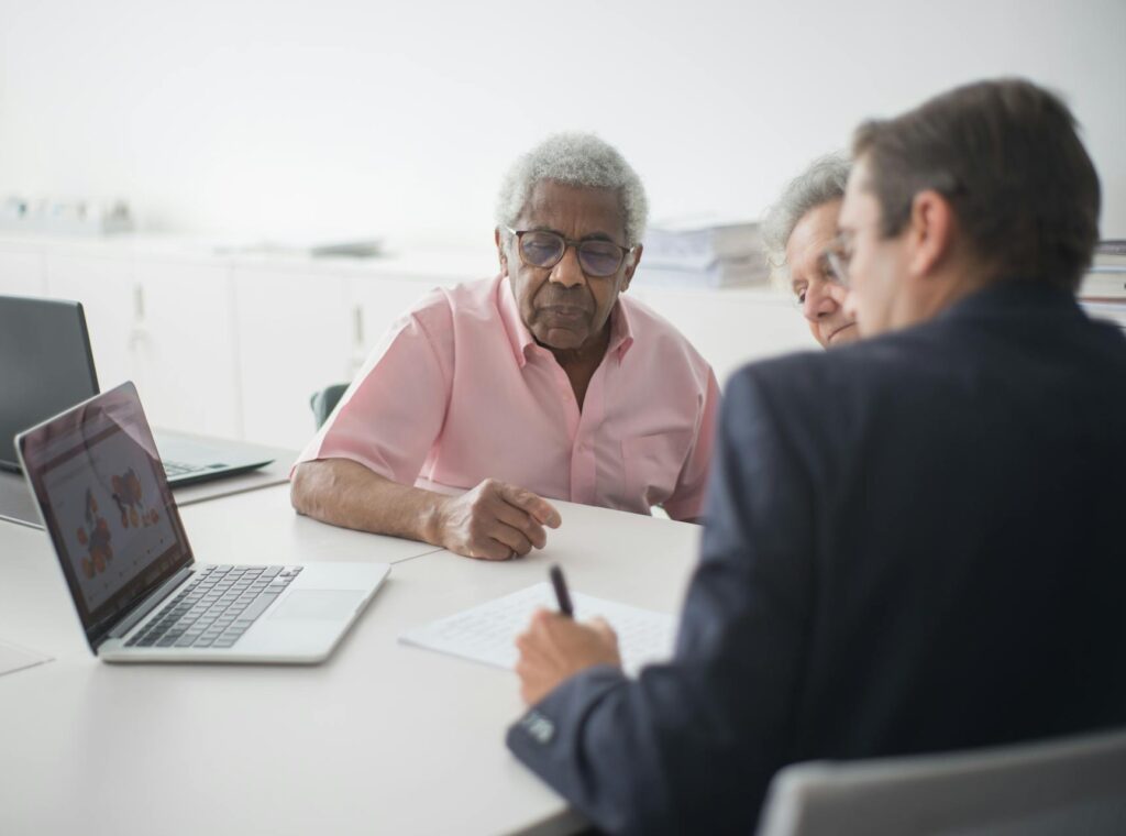 Elderly couple in a meeting